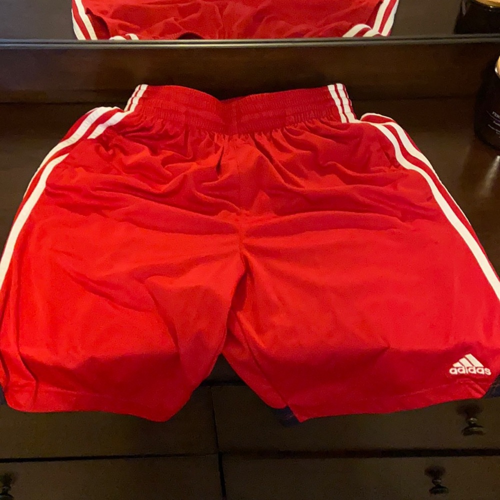 Red Adidas basketball shorts